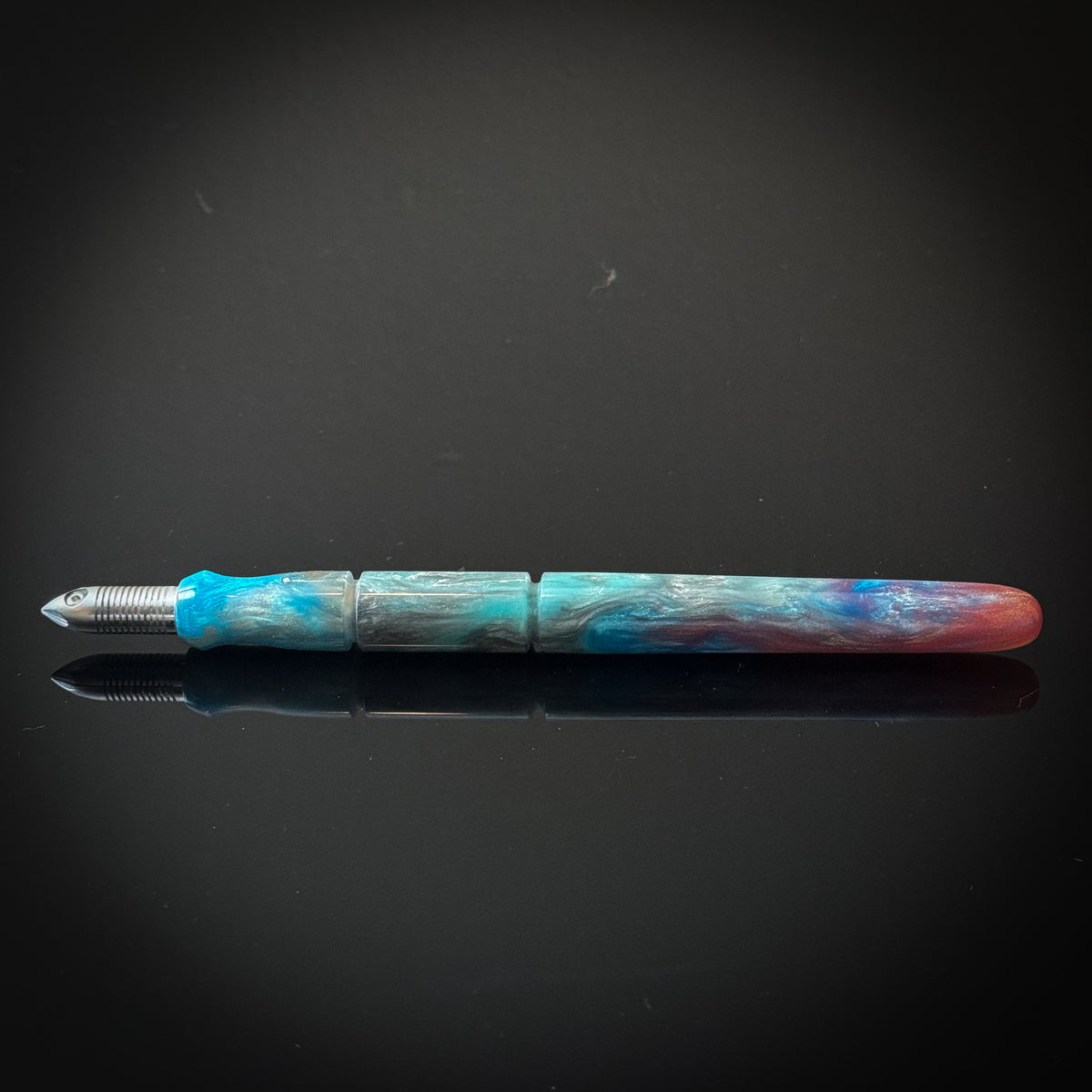 Teal and Red Polaris Nib Holder